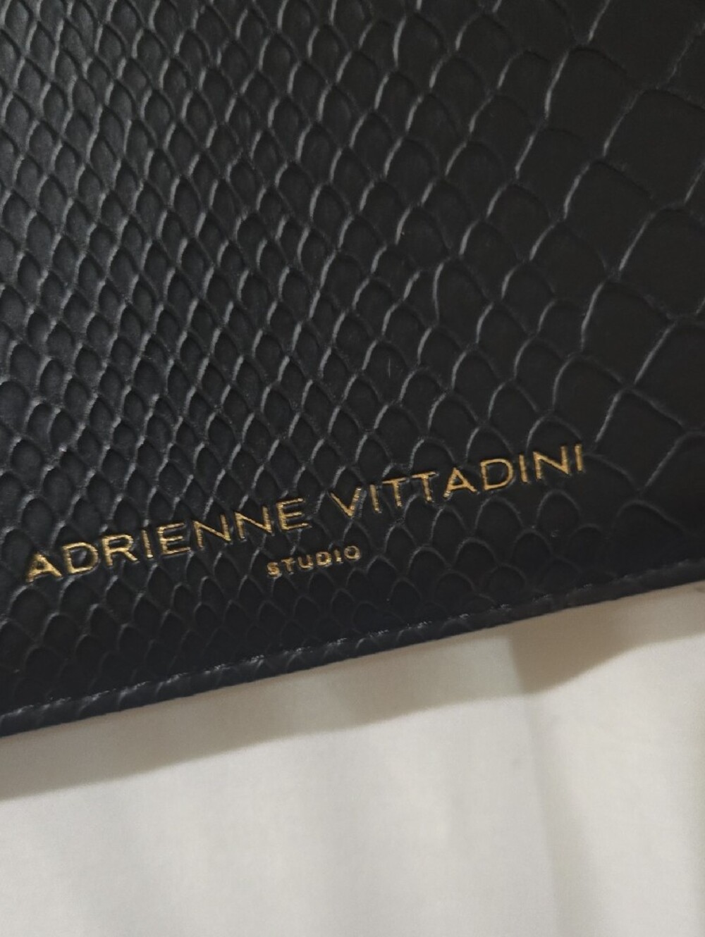 Adrienne Vittadini Black Embossed Zip-Around Wristlet - Picture 3 of 8